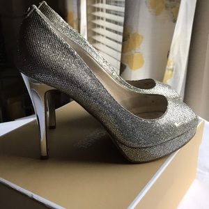 Women’s Silver Michael Kors heels. Size 9